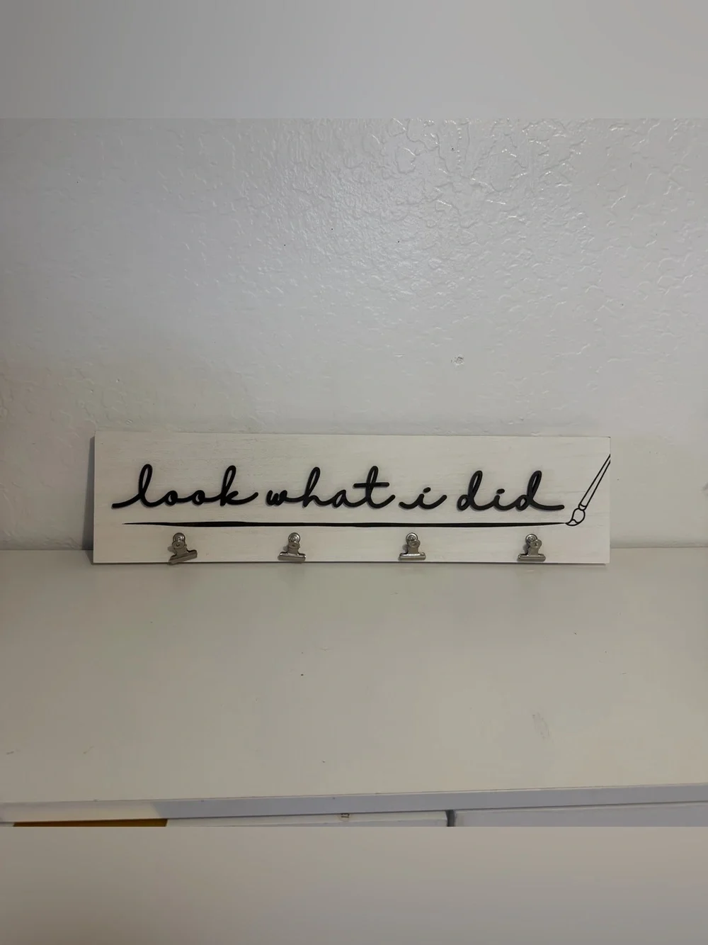 Kirkland Signature White Wall Clip Display with Black Script “Look what I did”
